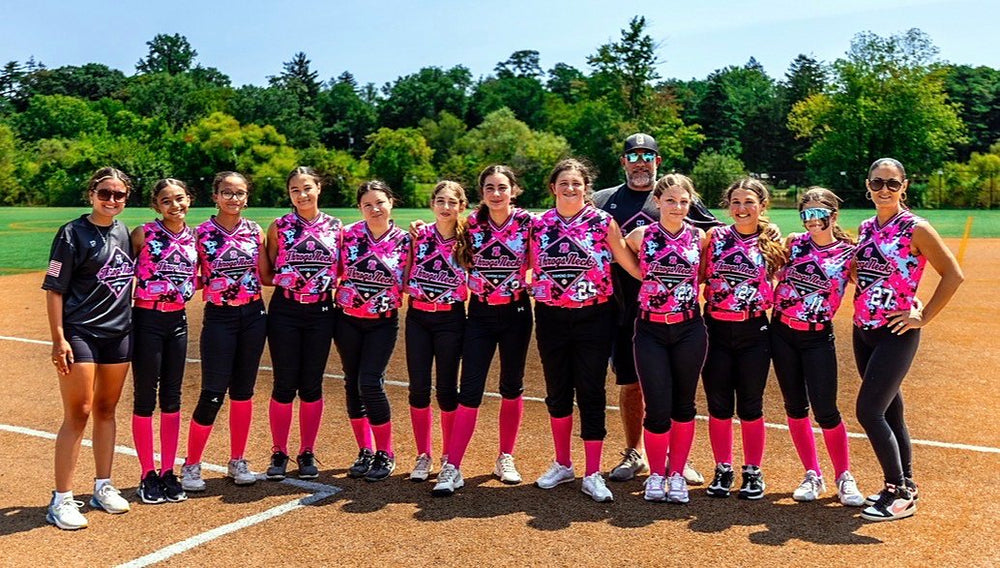 Throgs Neck youth softball team and coaches in custom pink camo 7Bros jerseys