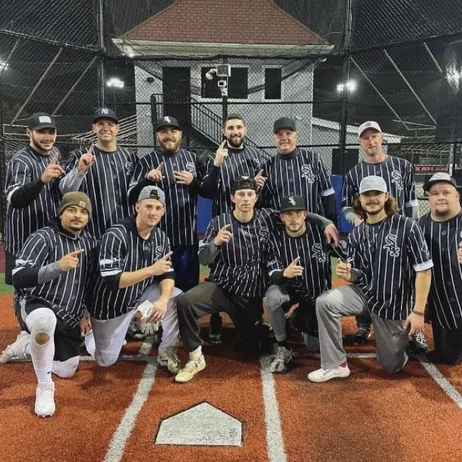 white and black softball team jerseys